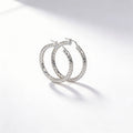 Diamond-cut hoop earrings in 925 sterling silver