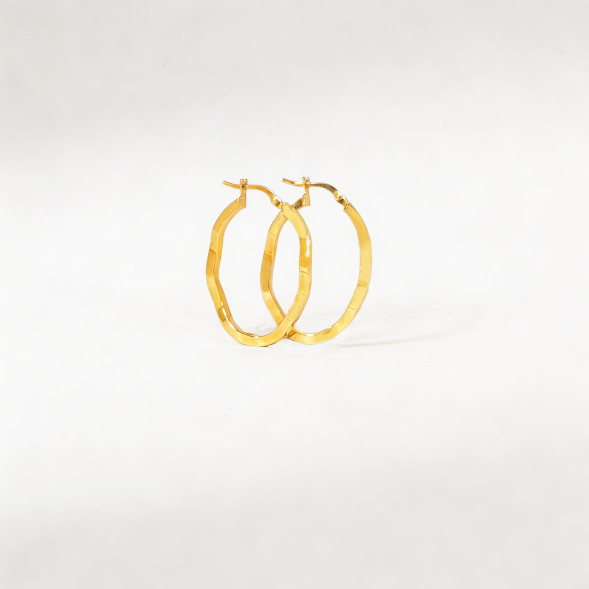 925 Sterling Silver Gold Faceted Oval Hoop Earrings - product view 1