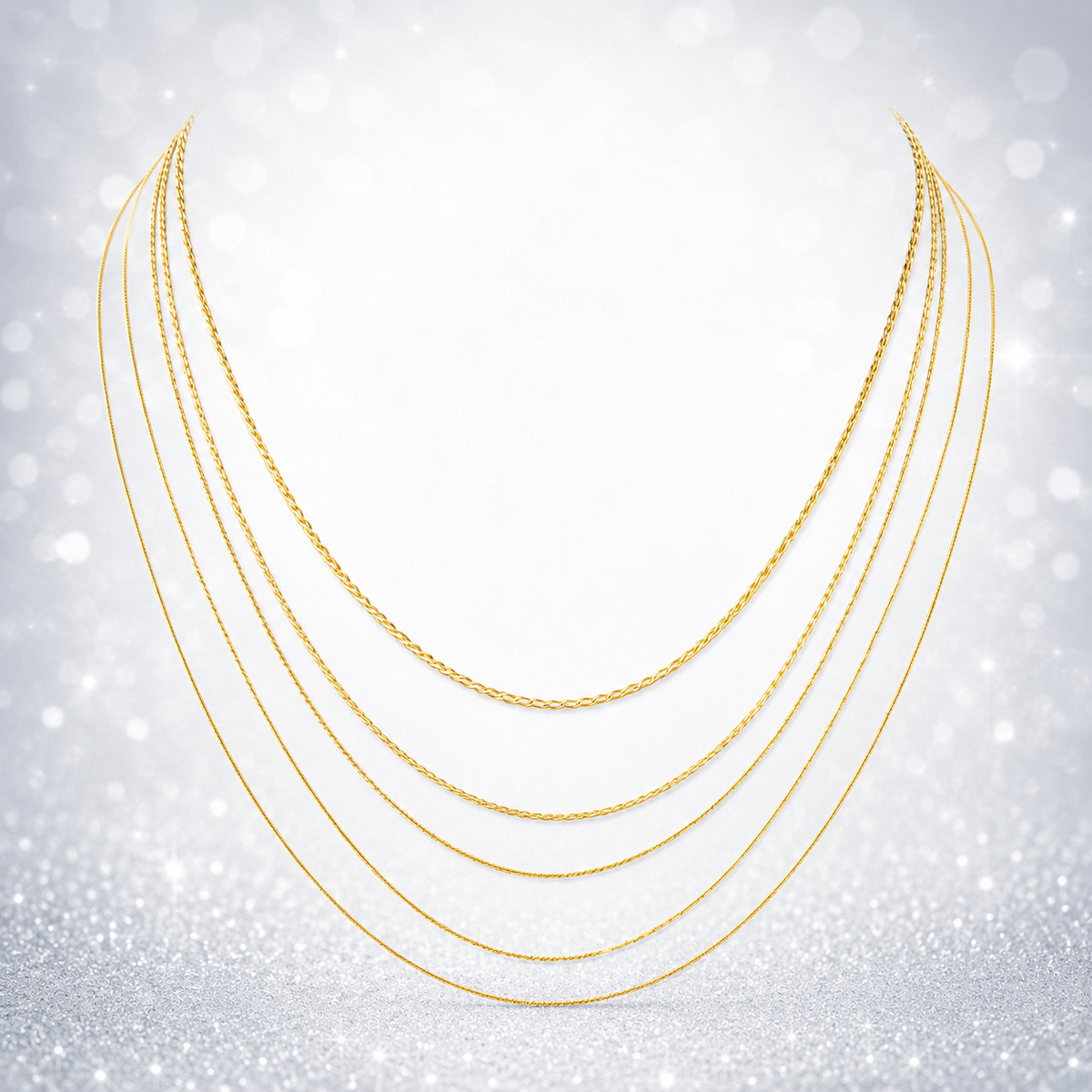 Close-up of gold-plated layered chain necklace